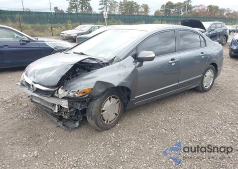 2010 Honda Civic Hybrid z USA, uszkodzony, nr VIN JHMFA3F2XAS003896